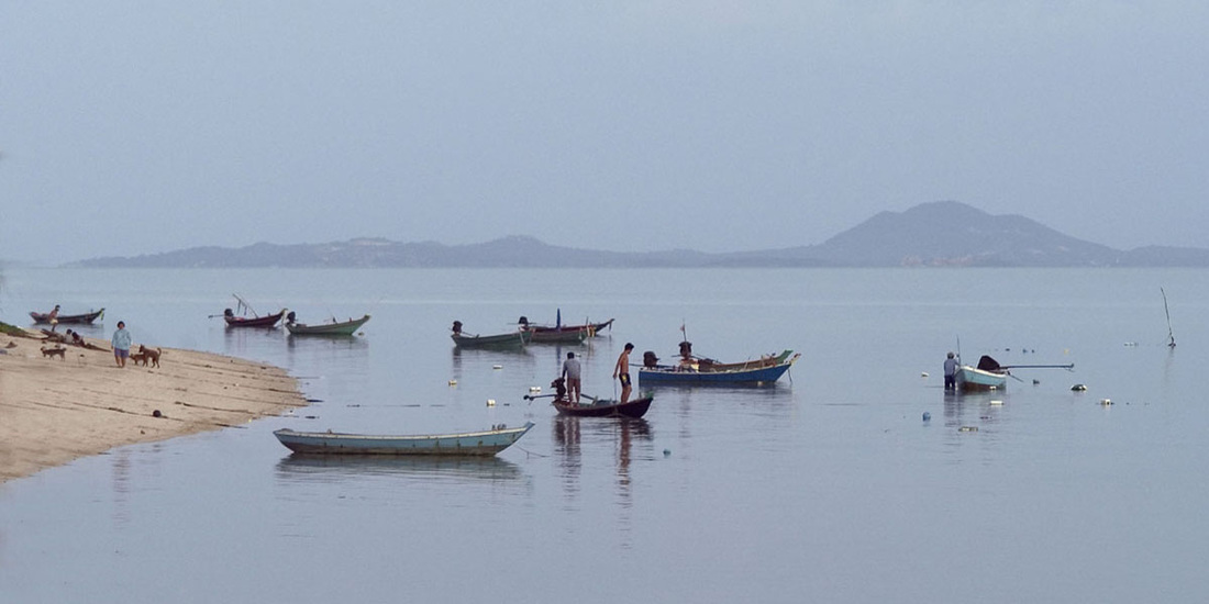 Fishermen on the coast of Pha Ngan, Thailand